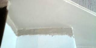 professionnel pour des travaux de revêtements sols et murs d'un appartement